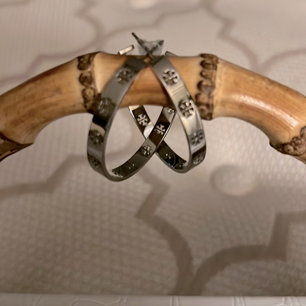 Tory Burch silver hoop earrings. Excellent condition, never worn.
